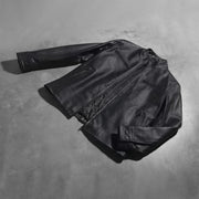 
Button & Hem Craftsmanship Construction Detail on Austere Matte Nero Giacca Biker in Pelle da Uomo