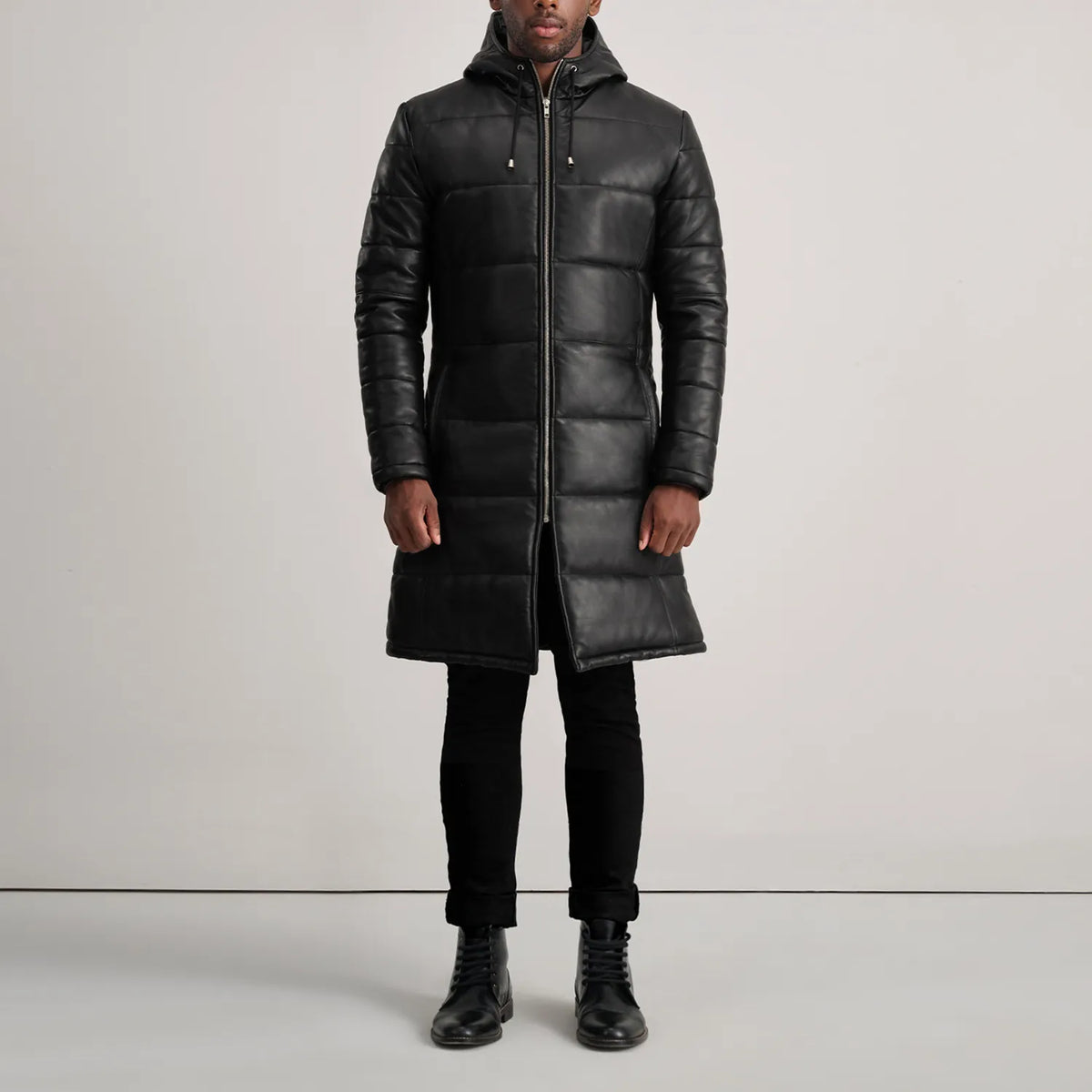 
Floyd Tan Hooded Leather Puffer Coat - Vista laterale che mostra il taglio ergonomico delle maniche