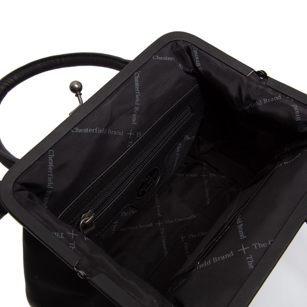 
Dettaglio ravvicinato of Classic Collar & Heavy-Duty Zipper Hardware on Chili Borsa a mano in pelle pieno fiore