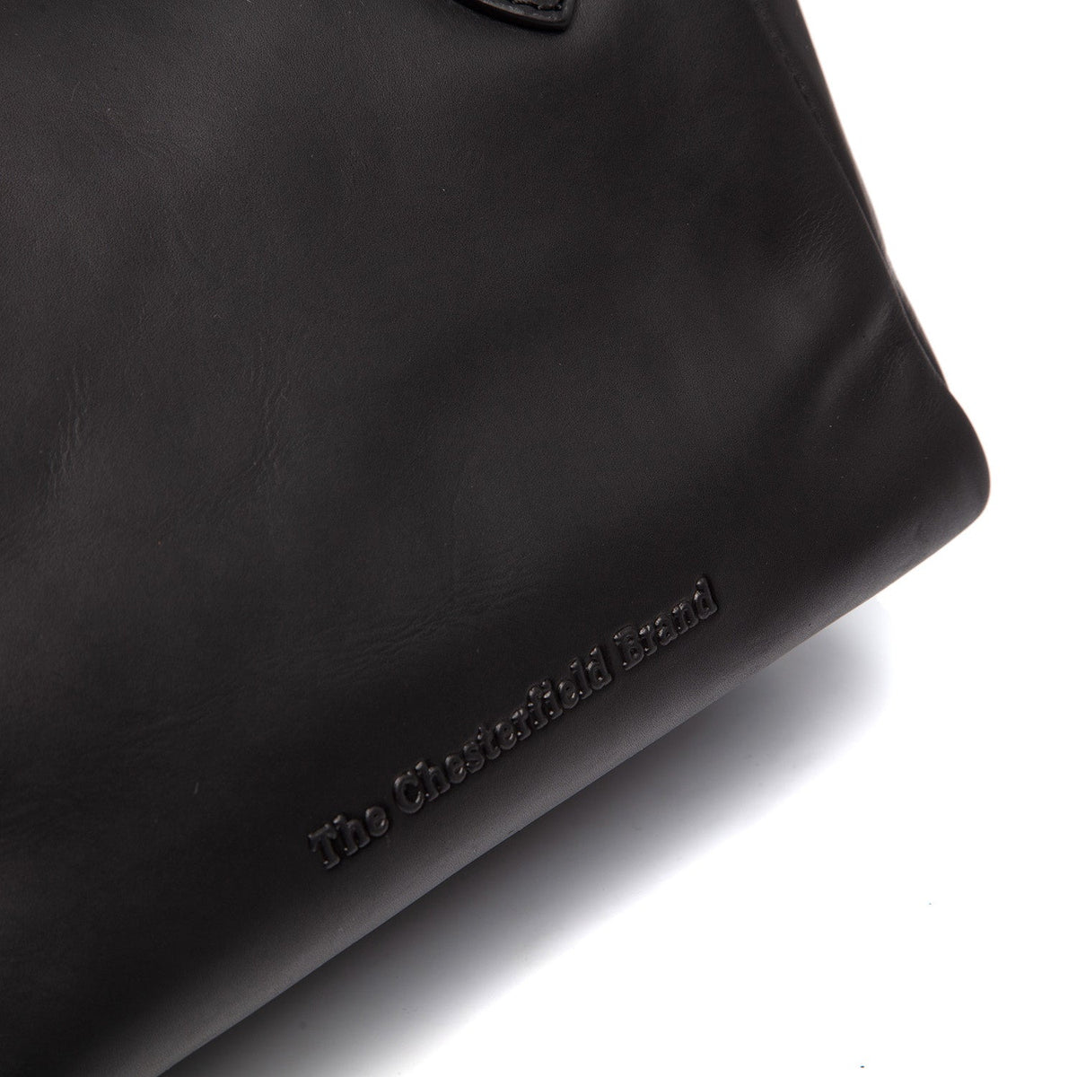 
Chili Borsa a mano in pelle pieno fiore - Vista laterale che mostra il taglio ergonomico delle maniche