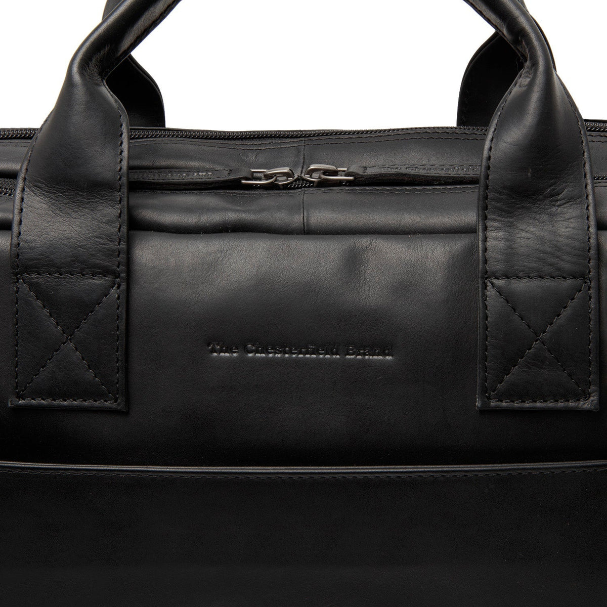 
Solid Antique Brass Hardware & Heavy-Duty Dual Zipper Detail on Frazer Borsa porta PC in pelle pieno fiore