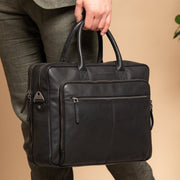 
Classic 100% Full-Grain leather Briefcase - Prospettiva posteriore con spallacci in pelle rinforzati