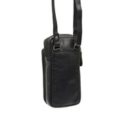 
Prospettiva indossata di Valdes Pelle Pieno Fiore Phone Bag su modello - Drappeggio naturale alla luce del giorno