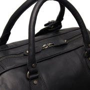 
100% Full-Grain Wax Pull-Up 100% Full-Grain Leather Grain Texture & Handcrafted Patina Detail