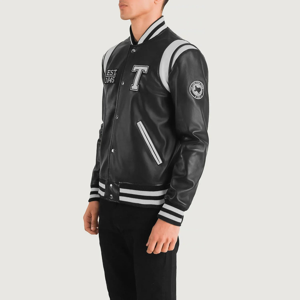 
Black & White Sheepskin Leather Varsity Jacket - Vista posteriore con spalle definite e orlo pulito