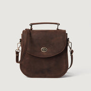 
The Sandra Vintage Distressed Brown Leather Saddle Bag For Women in Distressed Brown Full-Grain Leather - Full Exterior Vista frontale e silhouette sartoriale | Acquista online