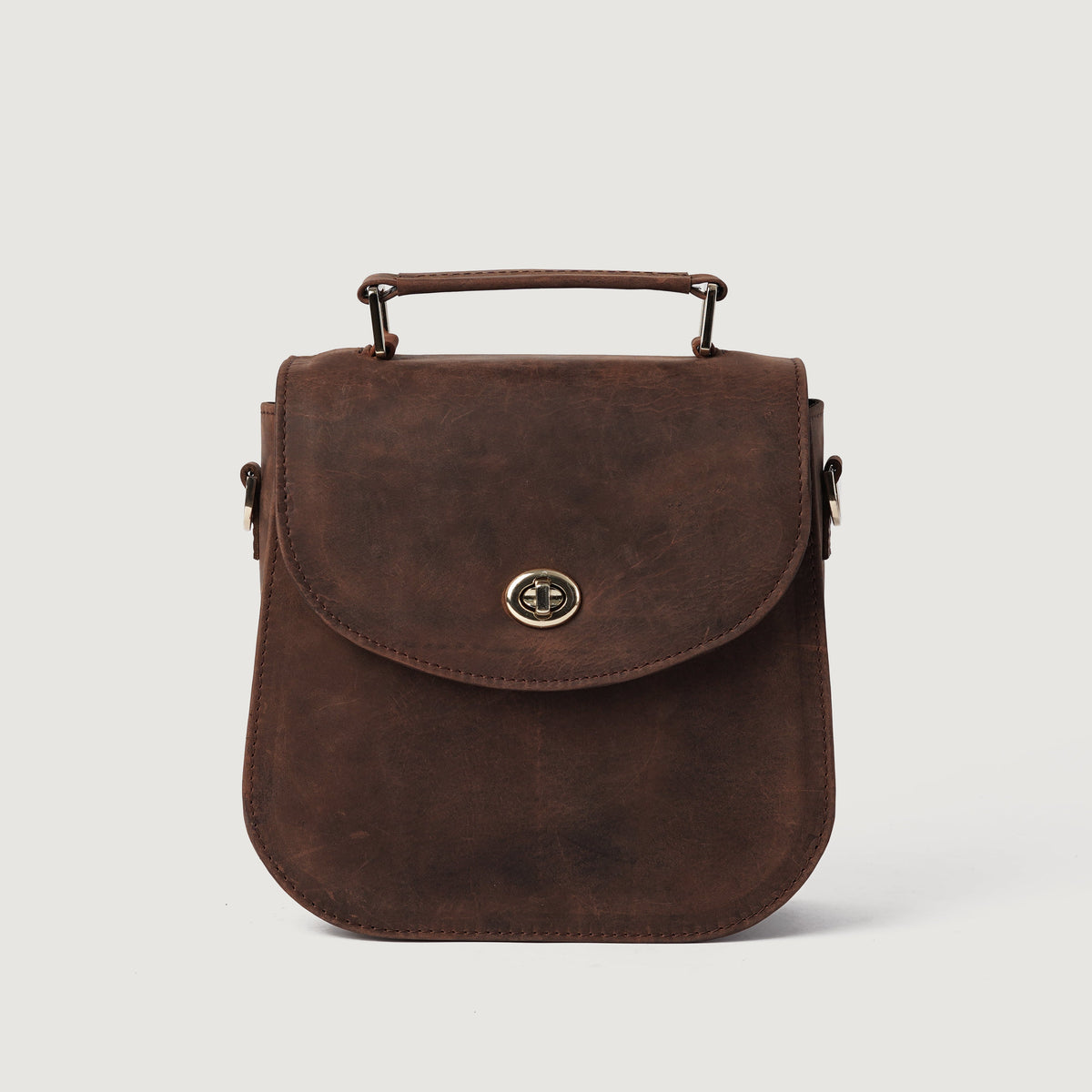 
The Sandra Vintage Distressed Brown Leather Saddle Bag For Women - Profilo laterale strutturato con profondità del soffietto